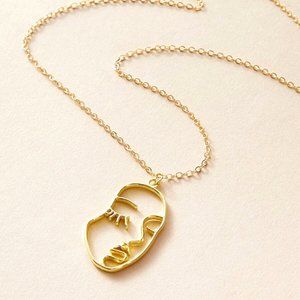 Goldtone Artsy Face Necklace NEW! 49A2